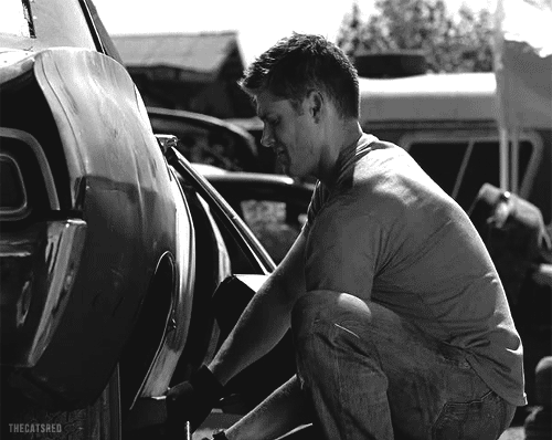 Dean Winchester working on Impala